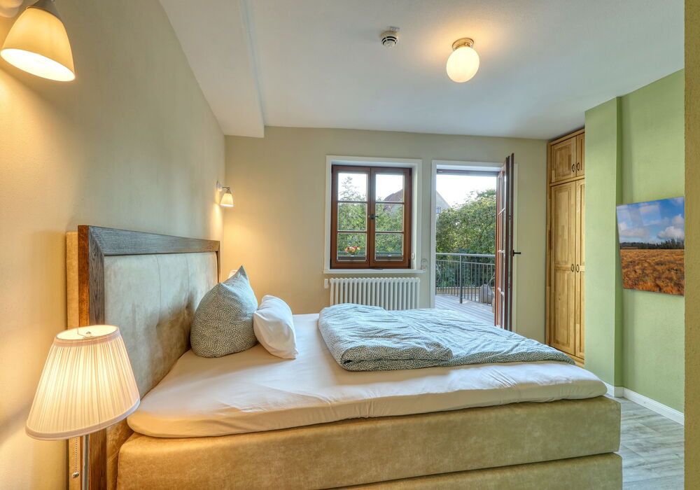 Cozy bedroom in apartment “Anna” with direct access to private terrace