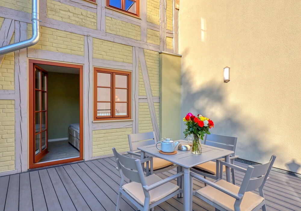 Private terrace of the “Anna” apartment with seating for 4 guests